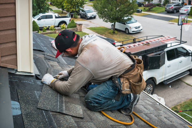 Professional Roofing technician working in Rowlett, TX